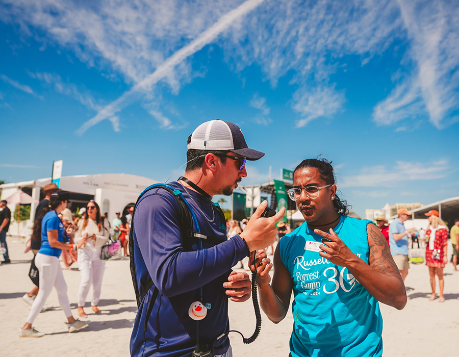 FIU student workers at a beach event