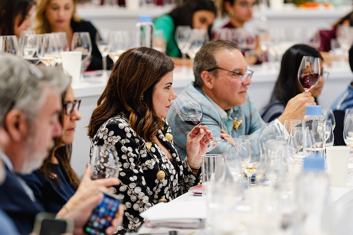 Attendees learning to evaluate wine